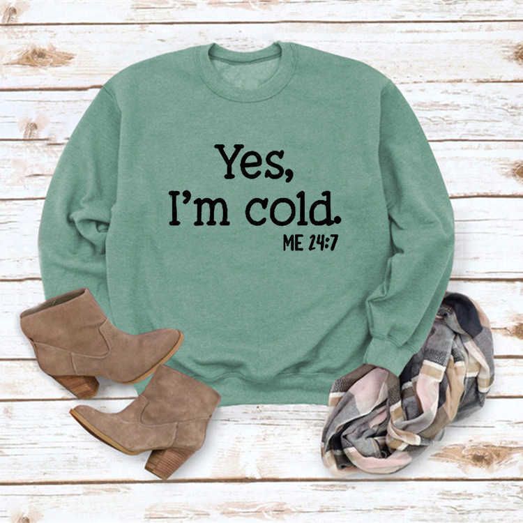 light green sweater (black font)