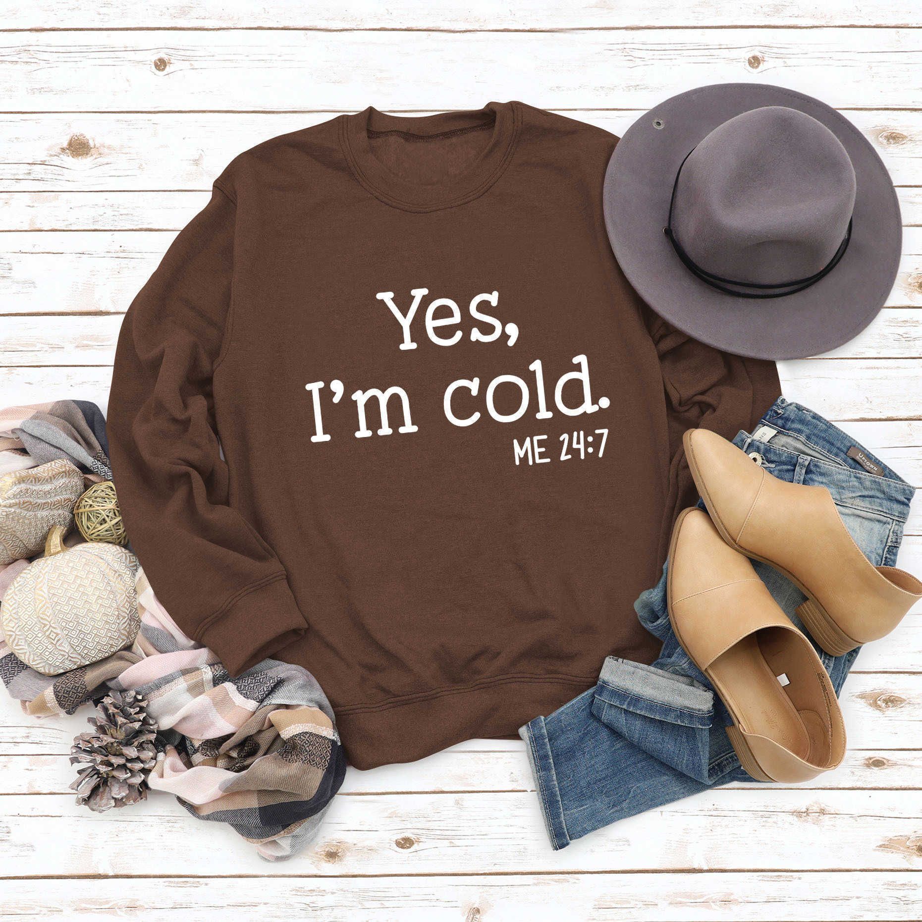coffee colored sweater (white font)
