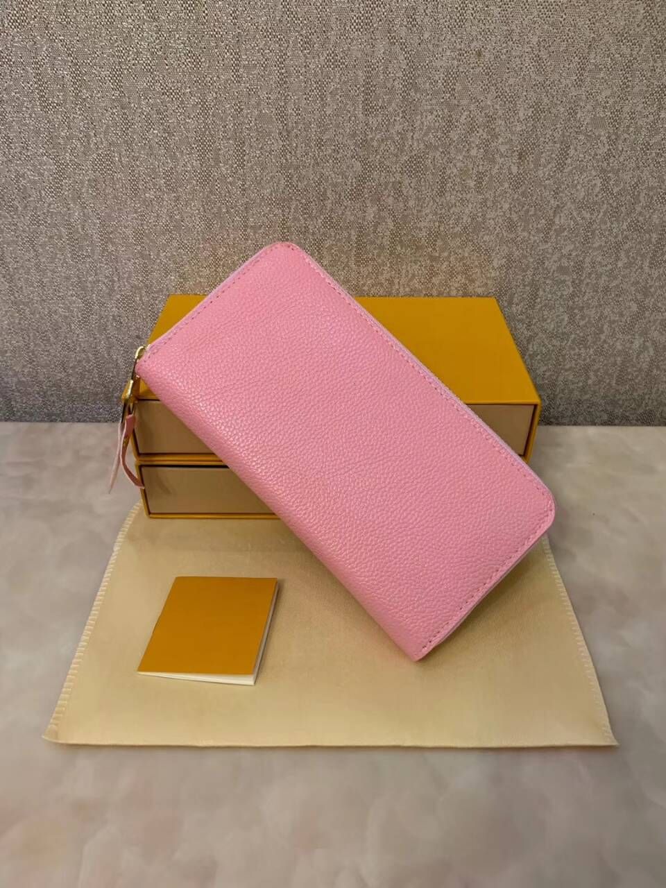 embossed pink wallet