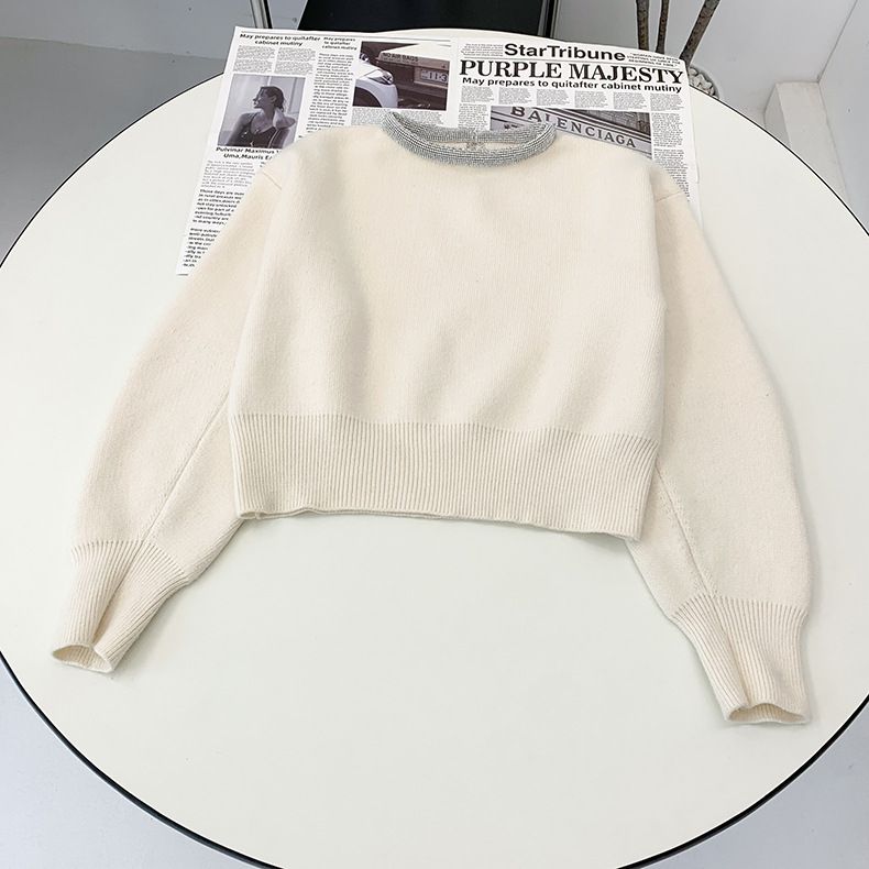 Белый пуловер