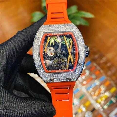 the white shell orange strap is the