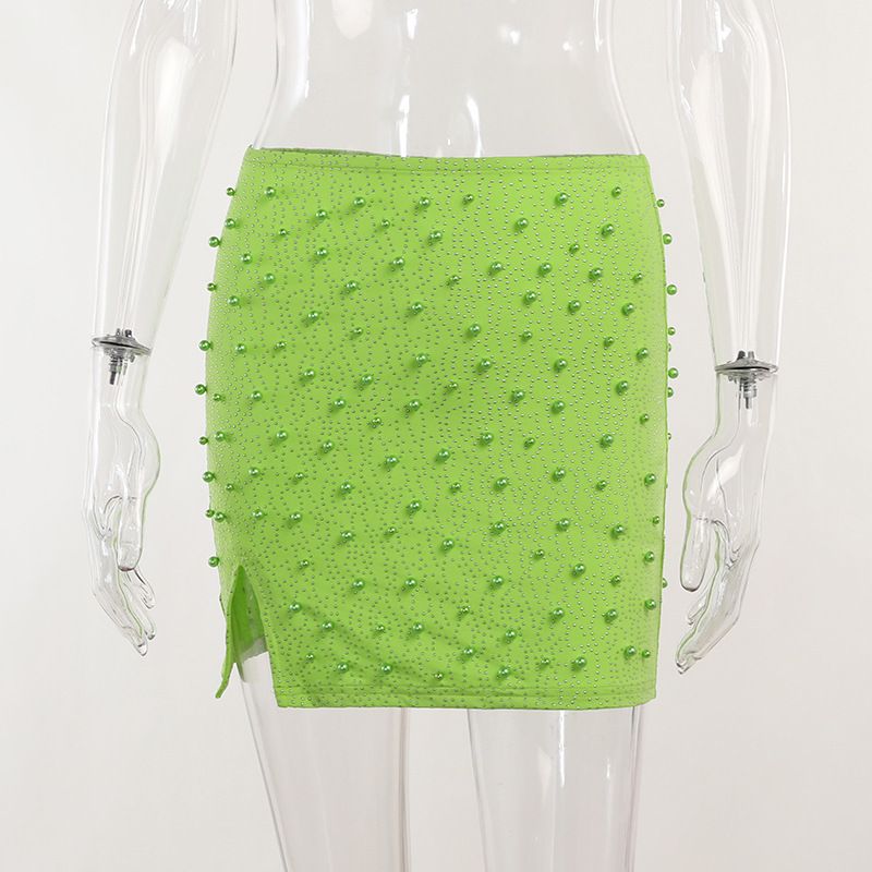 green mini skirt