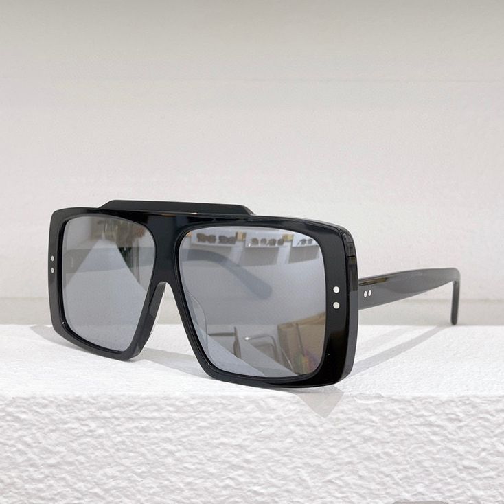 black frame silver mirror lens