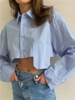 Женские блузки 2023 Осенний стиль укороченный пупок асимметричный сшивающий модный дизайн повседневной темперамент Короткая белая рубашка