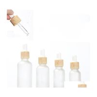 Bottiglie di imballaggio da 30 ml di bottiglia da contagocce vuota Vial Cosmetic Contenitore Glaccio in vetro smerigliato con goccia di bamb￹ imitato consegna dhxku