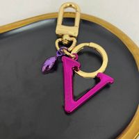 Torchia di design di lusso di lusso alla moda Calza vera in pelle autentica 6 colori Torchia classica Keys Block Keys Cuckle Mens Womens Borse Ciondolo