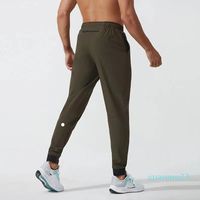 LL Jogger Men's Long Pants Sport Yoga Conjunto de yoga Drak Drawstring Gym Psockets Pantalones pantalones para hombres Casual elástica Fitness 66