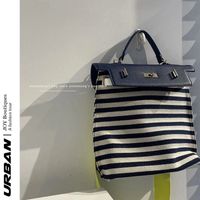 Bolsas de compras super-fogo de grande capacidade de contraste listrado em tela colorida moda moda moda nicho texture ladies handbag 230314