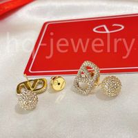 2023 Pendientes Diseñador para mujeres START Gold Gold Heart Forma Pearl Crystal Gold Doble V Carta 925s Joya de plata Classic 89494