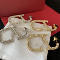 2023 Pendientes Diseñador para mujeres START Gold Gold Heart Forma Pearl Crystal Gold Doble V Carta 925S Joya de plata clásica