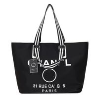 Designer Brands Bags Shopping Bags Women Triangle Etichetta Waterproof Leisure Travel Borse di grande capacità Nylon Mommy Tote Borse per spalla R0325