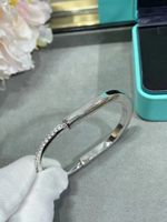 Anyone know where to cop this LV monogram bracelet in silver? I'm seeing in  oil slick but want a solid color : r/DHgate