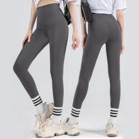 Pantalones activos Mujeres High Wasit Yoga Color sólido Super Stretch Entrenamiento Carriendo medias elásticas Leggings de gimnasio Bulift