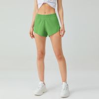 Novo produto de verão 2,5 polegadas soltas respiráveis ​​de secagem esportiva shorts femininos de ioga feminina shorts casuais
