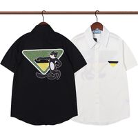 23ss Designer Herrenhemd Revers Damen Mode Dreieck Baumwolle Cartoon Bedruckt Kurzärmeliges Freizeit-T-Shirt 5A-Qualität Asiatische Größe M-2XL