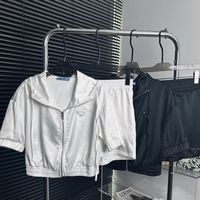 Frau Trainingsanzug Designer Frauen Mode Trainingsanzüge Sommer Sonnenschutz Zwei Stück Set Casual Outdoor Kurze Jacken Sets 23ss