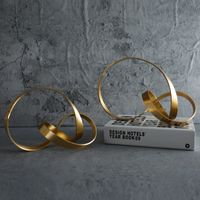 Objetos decorativos Figuras simples metal ouro hollow out twist arte ornamento
