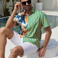 Chemises décontractées masculines 2023 Cheminée à revers de contraste européen et américain Summer Men's Loose Beach Patchwork Stripe imprimé à manches courtes