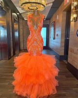 Vestidos de baile longos de sereia laranja brilhante 2023 Sexy Glitter Ligins Ruffles Graduation Party Dalds Robe de Bal Open Back