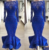 2023 Luxus Royal Blue Blue Abendkleider Meerjungfrau Langarm Boneau Hals Pailletten Perlen Kristalle Gewohnte formelle Anlässe tragen arabische Promkleid Vestidos