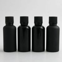 Lagerflaschen 10 x 50 ml ätherisches Öl gefrostete glatte schwarze Glasflasche mit Plastikkappe für Flüssigkeitsreagenzien -Pipettenschloss