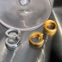 Pendientes de anillo liso de oro mate para mujeres en 2023, nuevo dise￱o, aretes circulares, lujo ligero, aguja de plata pura de alto grado
