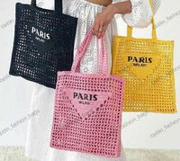 有名なデザイナーの女性バッグブランドアウトアウトアルファベットラフィアストロー織りトートバッグファッションペーパー織りバッグサマービーチハンドバッグラグジュアリーバッグ