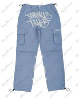 Pantalones para hombres y2k streetwear vintage pantalones de carga de bolsillo múltiples cintura estiramiento lateral de bolsillo azul claro pantalones de carga de baja altura ropa adolescente 230228
