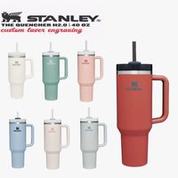Stanley Quencher H2.0 Vasos de acero inoxidable de 40 oz Vasos con mango de silicona Tapa y pajita Tazas para automóviles de segunda generación Siga bebiendo botellas de agua fría con logotipo