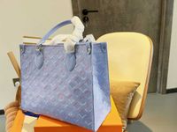 Bolsas de designer de luxo de alta qualidade do TZ Women Women Totes Gotes de grandes sacolas de compras de grande capacidade Bolsas de ombro de impress￣o azul 35cm de impress￣o azul 35cm