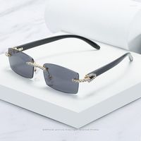 Óculos de sol 2022 Summer feminino sem aro com diamante Retângulo Retângulo Ladies 'Glasses Compras Viagem ao ar livre UV400
