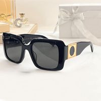 Designer homens homens Óculos de sol 4405 Moda Style Protection Random Frame