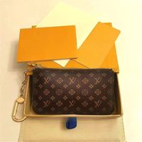 POUCHA CLAVE M62650 POCHETTE CLES Diseñador Fashion Womens Mens Ring Key Ced Coned Purse Purse Luxury Mini Billet Bag Charm Brown Canvas
