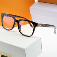 2022 occhiali da sole designer vintage di moda donna e uomo atteggiamento in metallo fram forams blocchi di protezione da esterno con scatola con scatola