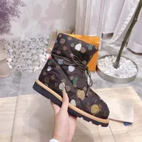 Botas de designer de luxo feminino à prova d'água da bota de bota de inverno Trabalho de fundo plano bota boot snow raçar 35-41 com caixa
