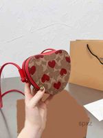 Bolsos de noche 2022 bolsos de forma de corazón mujer lindo bolso de mano correa para hombro anudado diseñador de cuero