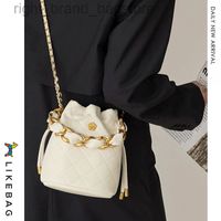 2022 고급 빈티지 버킷 크로스 바디 백 여성 브랜드 체인 꽃 금속 작은 메신저 가방 여성 캐주얼 패션 어깨 가방 W220812