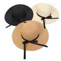 Summer Girls Grass Braid Hats Children's Bow Ribbon Capas de playa Ni￱os Huecidos Sunhats Fashion Fashion Sombrero de paja Bows A9296205m