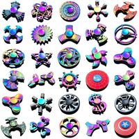 120 نوعًا تململ ألعاب Spinner Toys Rainbow Hand Spinners Tri-Fidget Gyro Dragon Wings Eye Finger Toppinner مع صندوق