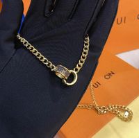 Moda tasarımcı kolye kolye klasik premium mücevher kolye cazibesi kadın stil aksesuarları sıcak seçim markası Noel 18k altın hediye x335