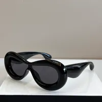 Женские дизайнерские солнцезащитные очки для женщин мужчины солнцезащитные очки Мужские модные глаза соединены кошачьи глаза UV400 смешные хип -хоп европейский 40099 дизайнерские очки очков