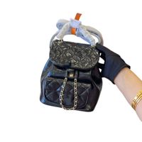 Hot Luxurys Designerbags Mochila Clássica Mochila Mulher Bolsas de ombros Dermal Pacote de Lazer de Lazer de Casamento de Banquetes 2022 27/22cm