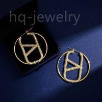 2023 Boucles d'oreilles Designer pour femmes Stud Luxury Gold Heart Shape Pearl Crystal Gold Double V Letter 925S Silver Jewelry Classic 85