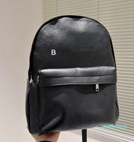 10A العلامة التجارية مصممة على ظهر حقيبة ظهر للأزياء جلدية BLCGA حقيبة كبيرة 56 حقيبة سفر مدرسية بسيطة ومتينة الحجم 31 × 40 سم