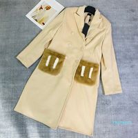 Neue Designerin Frauen Winter Coat Grabenmäntel Nerzhaarbuchstaben Pocket Ladies Pelzmäntel Überlösungen