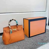 Sacs en cuir authentiques Birkins Handbags Luxurys Designer Femmes Top Layer Cow Hide Tote Sac de haute qualité Perkin Lychee Patte
