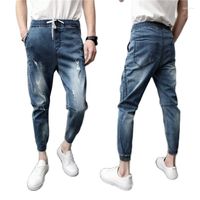 Мужские брюки мужские весенние маленькие ноги разорванные джинсовые молодежные нищие подростки уличный случай повседневного шнурки ковбойский гарем