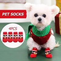 ملابس الكلاب عيد الميلاد الديكور الجوارب الحرارية غير قابلة للانزلاق 4pcs غطاء الحذاء لخريف شتاء القط الأحذية المحبوك
