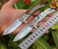 Color de 2 colores de mango VG10 Damasco Bola de acero R￳dido Flipper Knifes plegables Knifes de regalo de bolsillo EDC con vaina de cuero25136828572