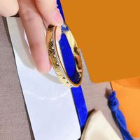 23SS Marka Tasarımcıları Erkek Kadın Bileklik Bilezikler Lüks Presbyopia 18K Altın Kaplama Harfleri Paslanmaz Çelik Mücevher Deri Moda Aksesuarları Düğün Hediyesi S267